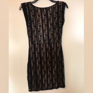 Black and nude dress with a beautiful open back